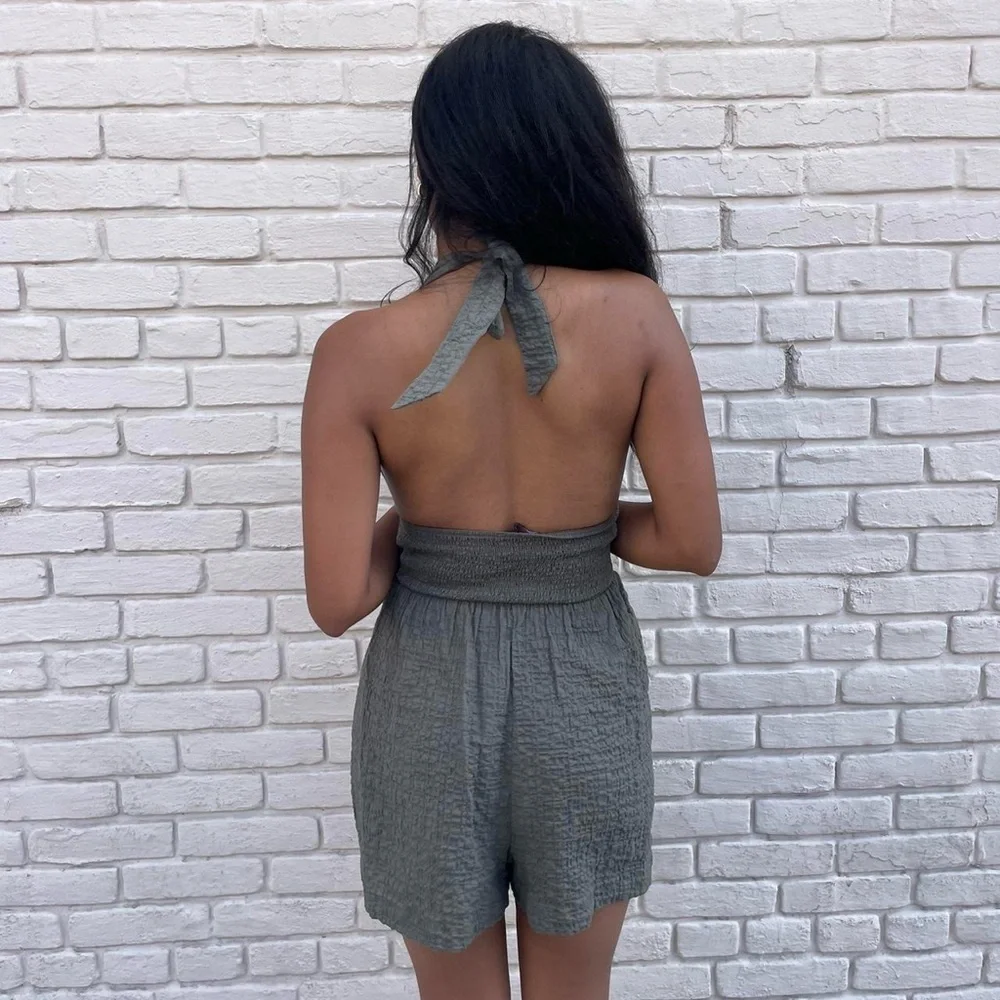 Zara green linen romper with a deep V neck, halter neck and tie back sz xs